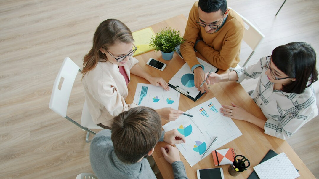 team of analysts reviewing insurance data
