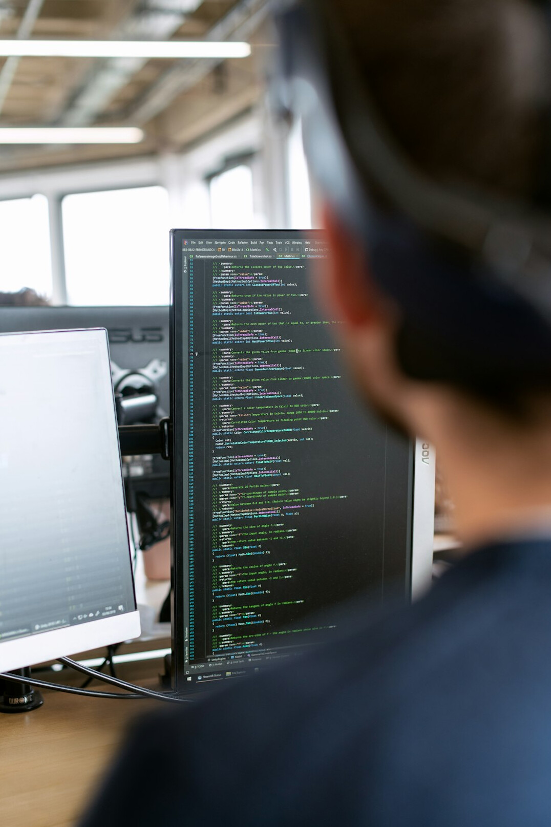 programmer analyzing insurance data