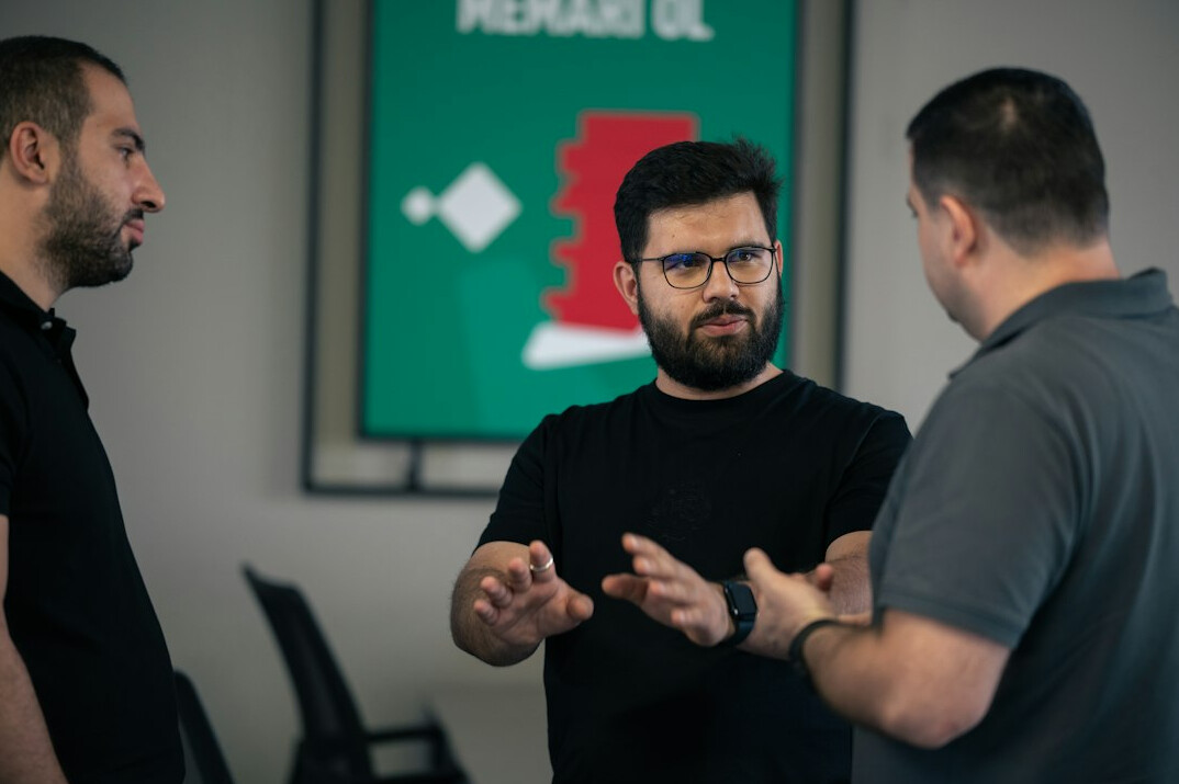 team discussing insurance tech