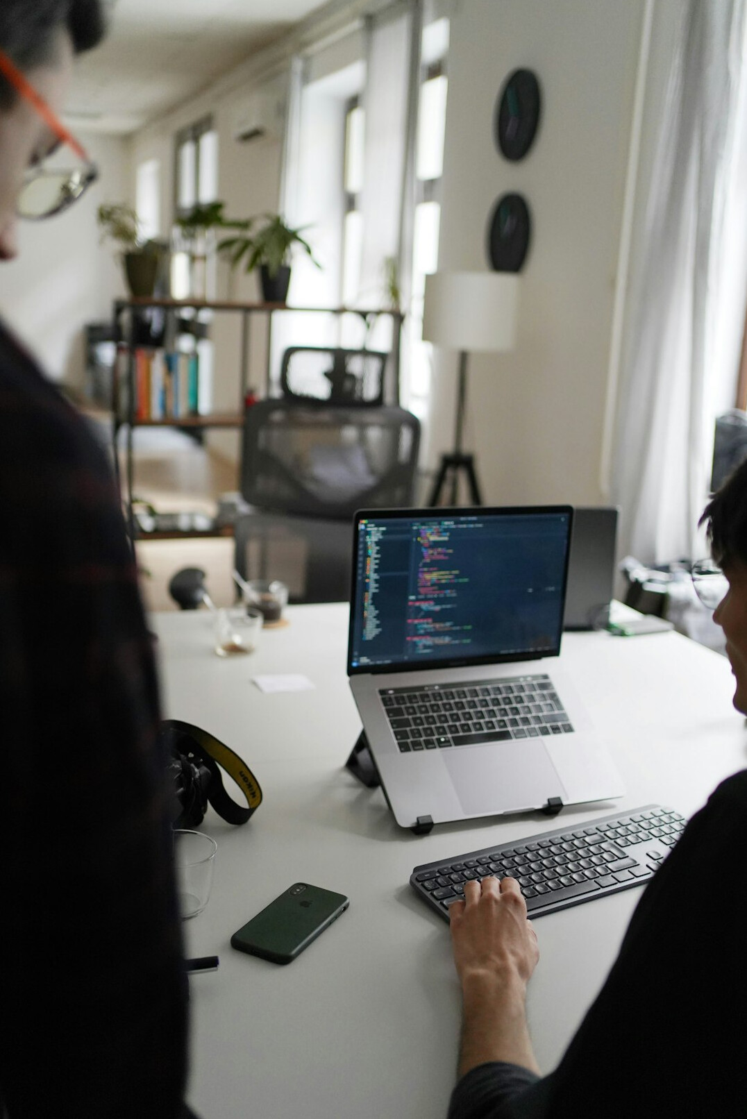 programmer coding at desk